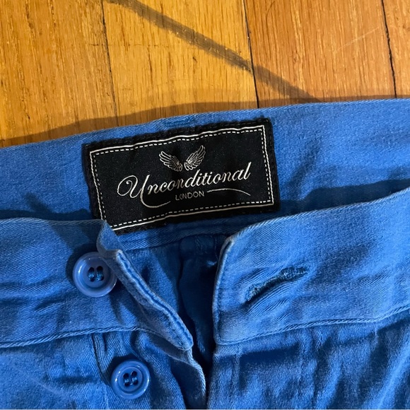 Unconditional blue pants with zipper details - Picture 2 of 6